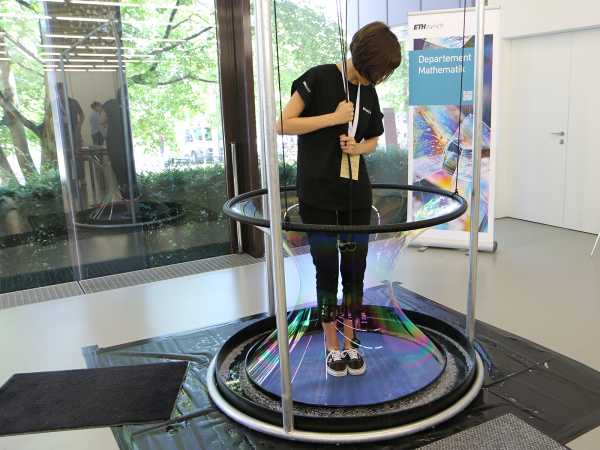 Enlarged view: Visitors at the Scientifica stand of the D-MATH